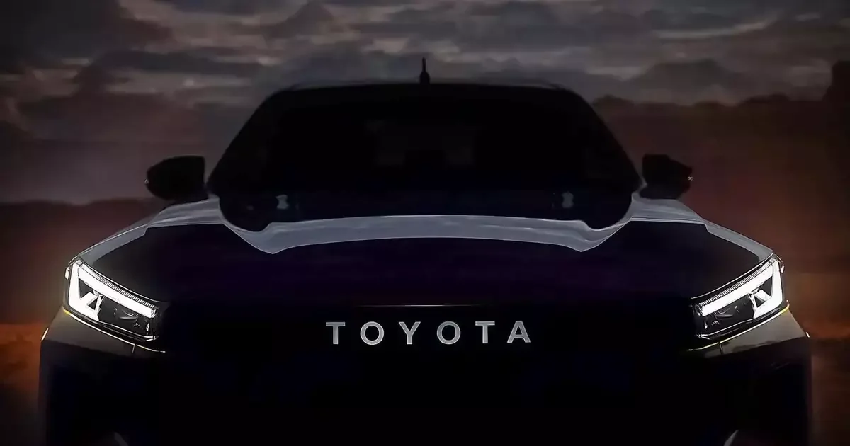 Vista frontal do Toyota Hilux 2026 com foco nos faróis de LED.