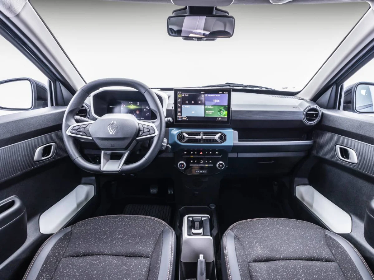 Interior moderno do Renault Kwid E-Tech 2026.