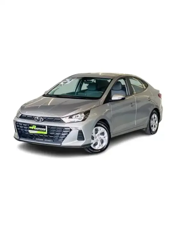 Hyundai HB20 prata em estacionamento.